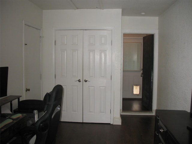 office area with dark wood-type flooring