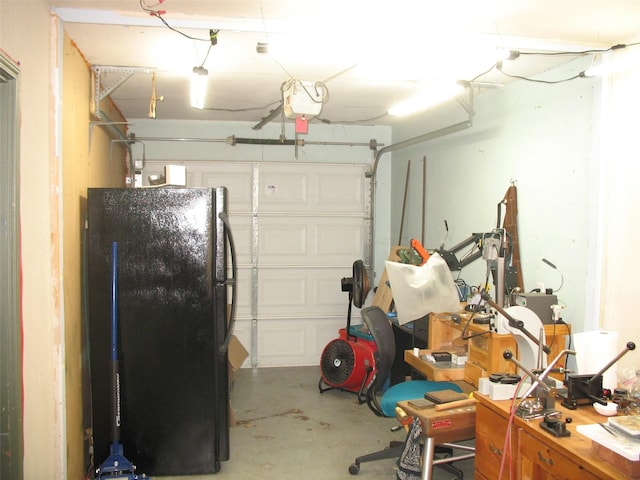 garage featuring black refrigerator