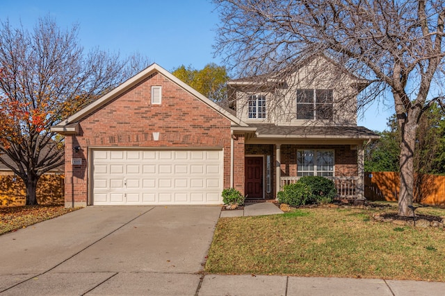 view of property with a front yard and a garage