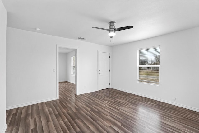 unfurnished bedroom with dark wood-type flooring and ceiling fan