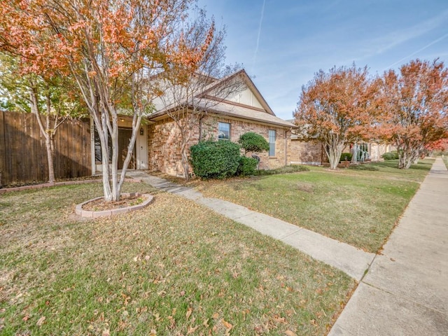 view of front of home with a front yard