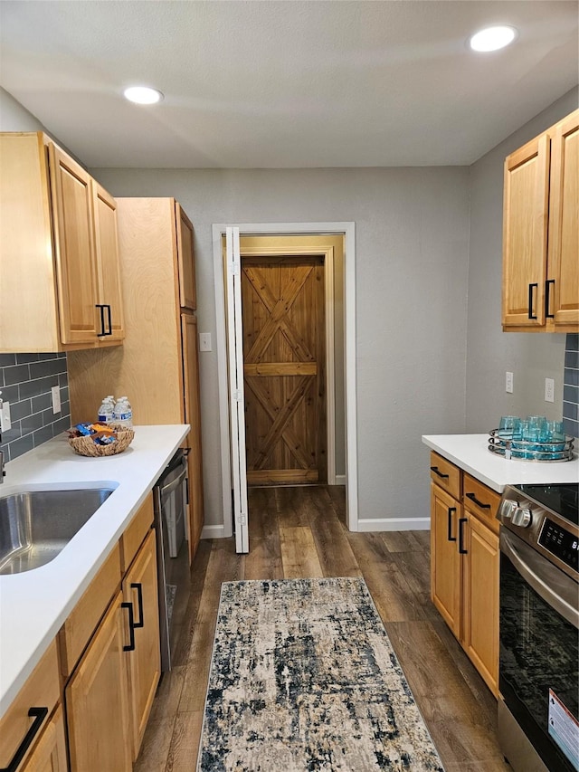 kitchen with stainless steel electric stove, dark hardwood / wood-style floors, black dishwasher, and tasteful backsplash