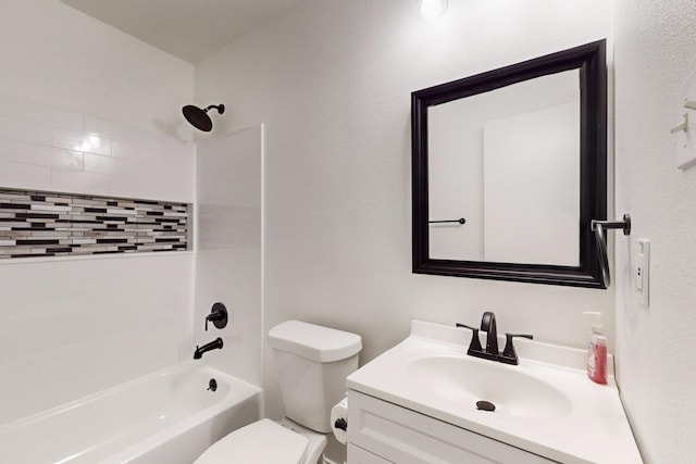 full bathroom featuring toilet, vanity, and tiled shower / bath