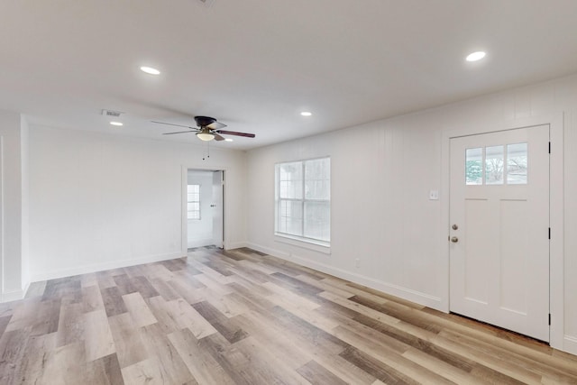 entryway with ceiling fan and light wood-type flooring