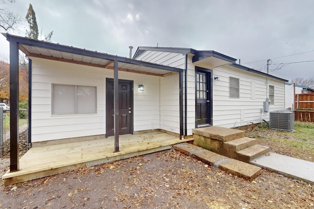 view of front of house featuring central air condition unit