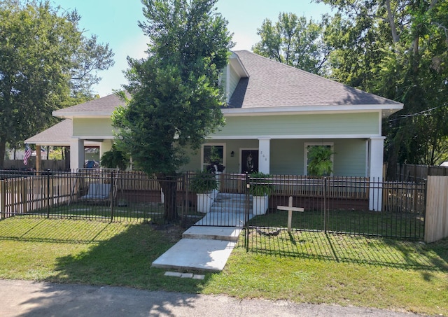 view of front of property featuring a porch and a front lawn