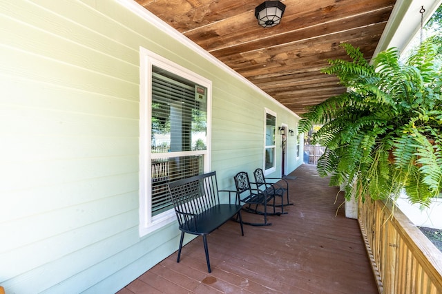 wooden deck featuring a porch