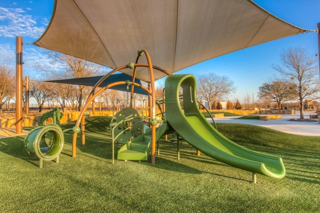 view of play area featuring a lawn