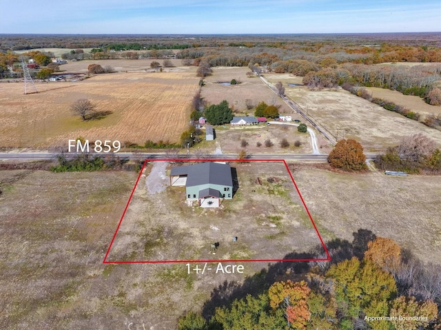 birds eye view of property featuring a rural view