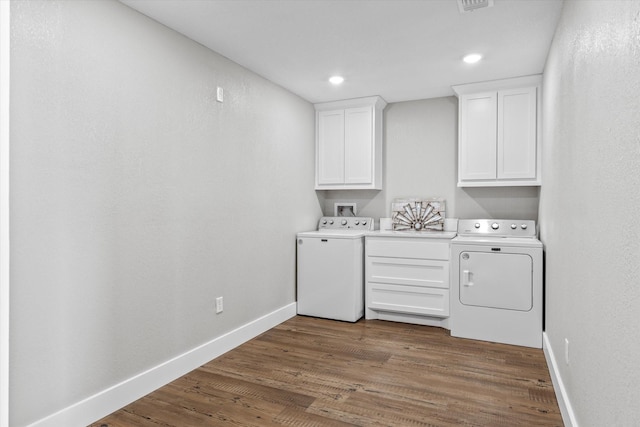 washroom featuring recessed lighting, wood finished floors, cabinet space, and baseboards