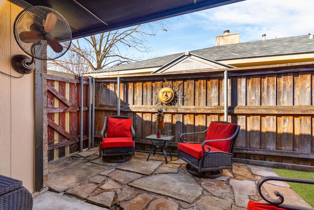 view of patio with ceiling fan