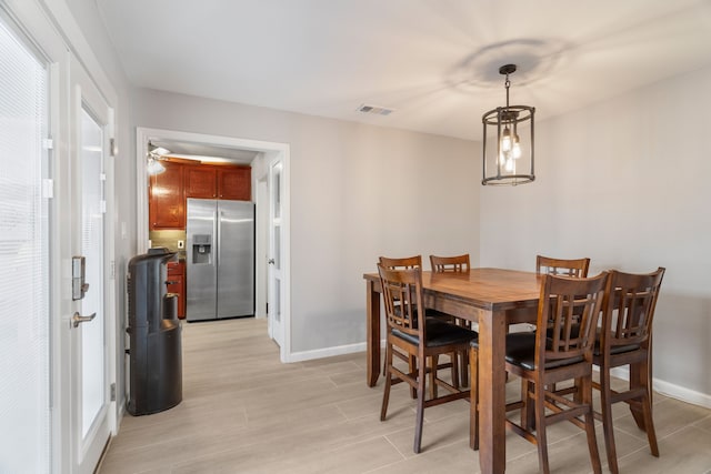 dining space featuring light hardwood / wood-style floors