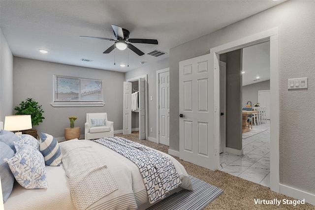 bedroom featuring baseboards, ceiling fan, marble finish floor, and visible vents