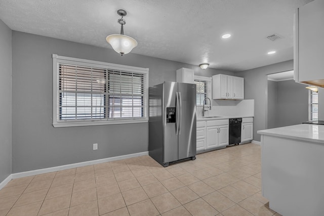 kitchen with white cabinetry, sink, hanging light fixtures, light tile patterned floors, and stainless steel fridge with ice dispenser