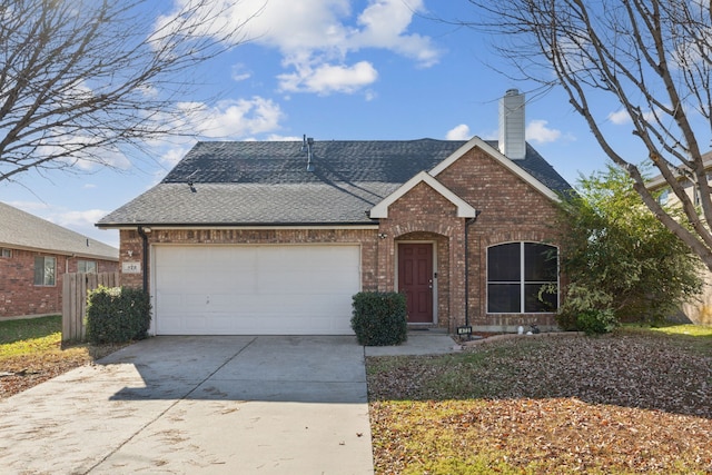 view of front of house with solar panels and a garage