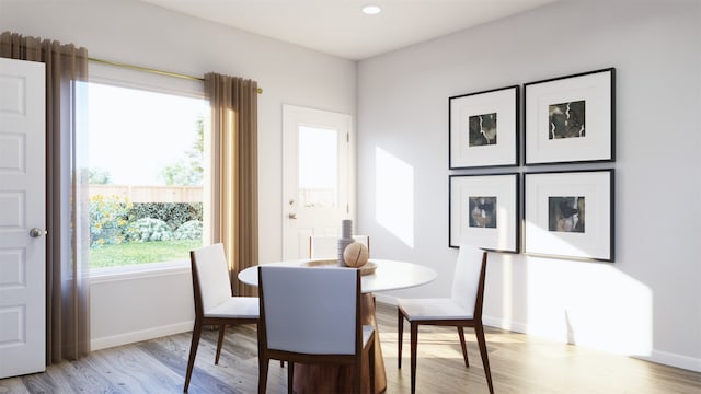 dining room with light wood-type flooring