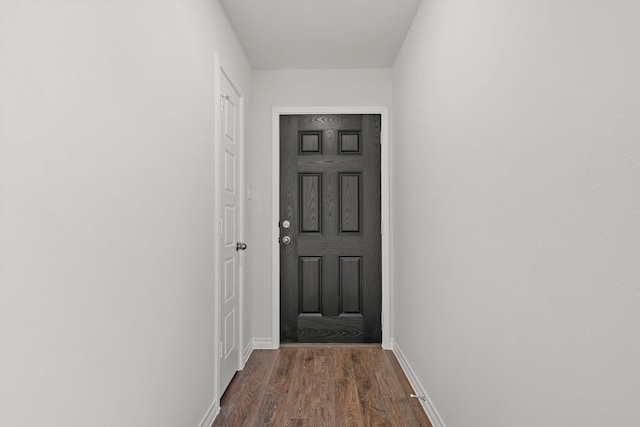 doorway featuring dark hardwood / wood-style flooring