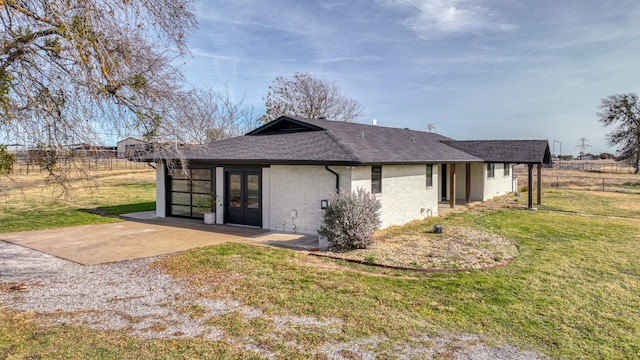 737 Green Branch Rd, Weatherford, TX 76085 - back of property featuring french doors, a shingled roof, and brick siding