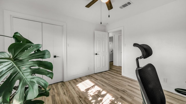 office area featuring light wood-type flooring and ceiling fan