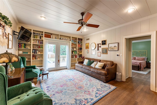 living room featuring french doors, built in shelves, wood ceiling, ornamental molding, and dark hardwood / wood-style floors