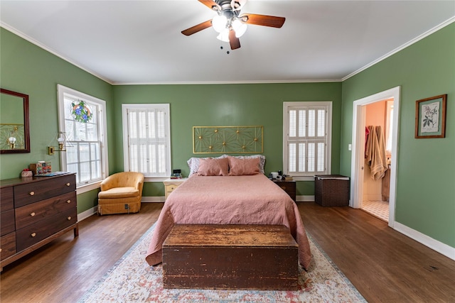 bedroom with multiple windows, wood-type flooring, and ornamental molding