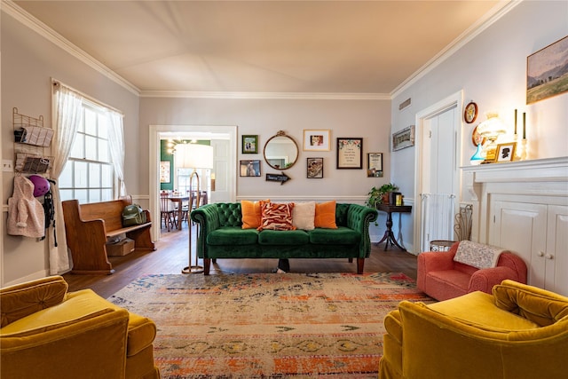 living room featuring ornamental molding and hardwood / wood-style floors