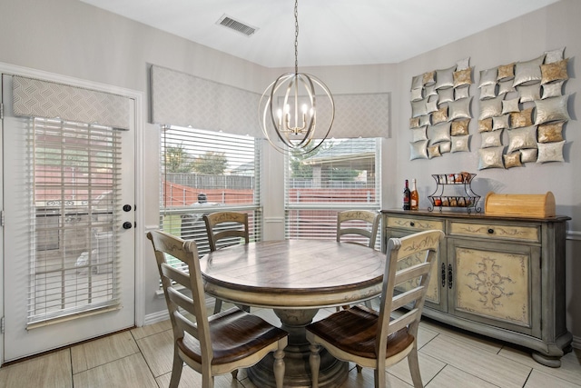 dining room featuring a chandelier