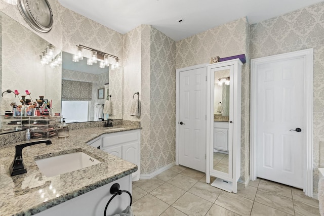 bathroom with vanity and tile patterned floors