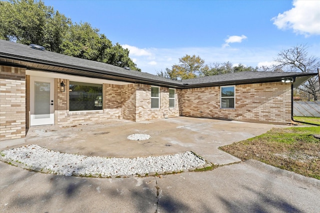 rear view of property with a patio