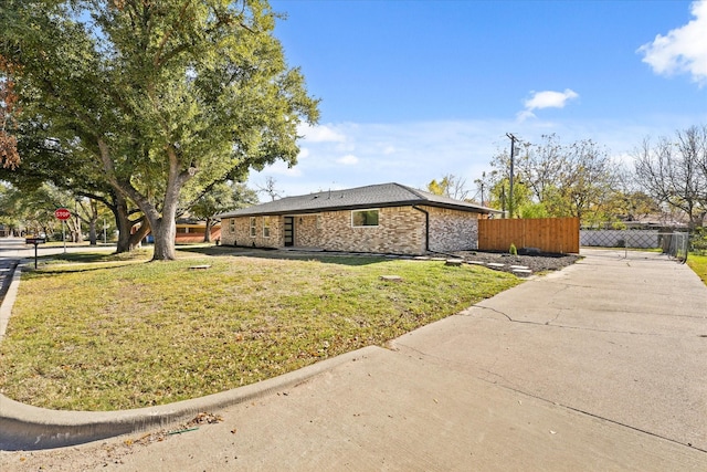 view of home's exterior featuring a lawn