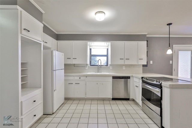 kitchen featuring stainless steel appliances, crown molding, sink, pendant lighting, and white cabinetry