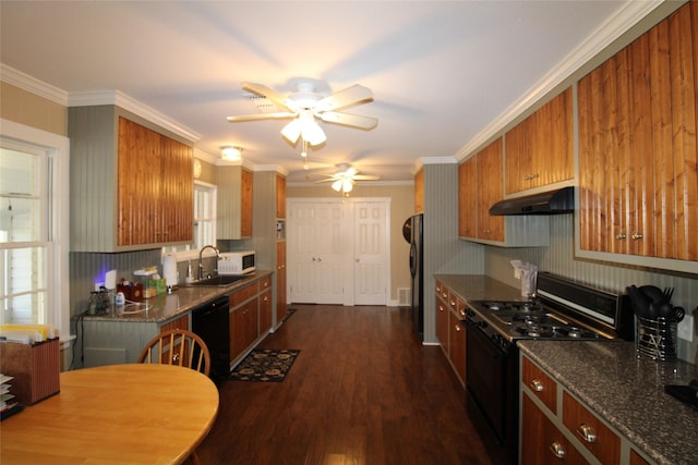 kitchen featuring ornamental molding, ceiling fan, sink, black appliances, and dark hardwood / wood-style floors