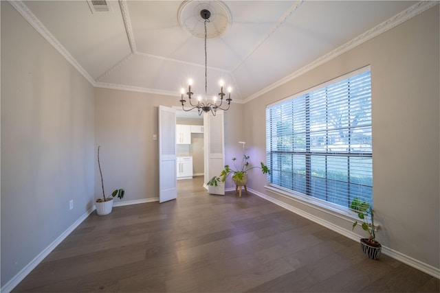 unfurnished dining area with ornamental molding, dark wood-type flooring, an inviting chandelier, and lofted ceiling