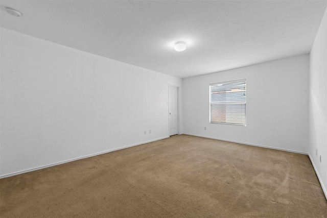 unfurnished room with carpet floors