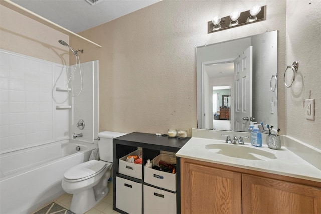 full bathroom featuring tile patterned floors, vanity, bathtub / shower combination, and toilet