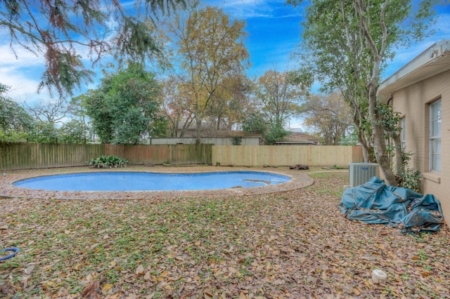 view of swimming pool featuring cooling unit