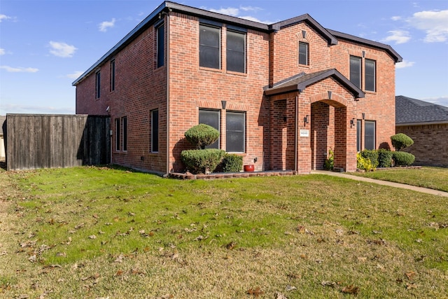 view of front facade featuring a front yard