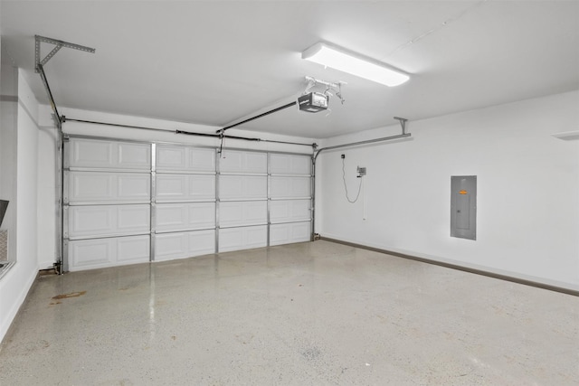 garage with electric panel and a garage door opener