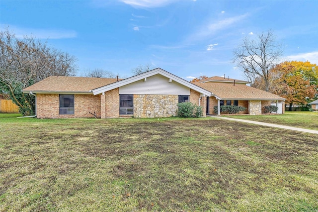 single story home featuring a front yard