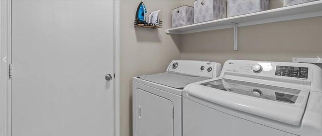 laundry area featuring independent washer and dryer