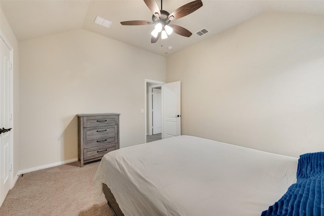 carpeted bedroom featuring lofted ceiling and ceiling fan