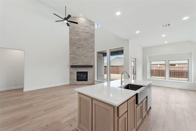 dining area with lofted ceiling and light wood-type flooring