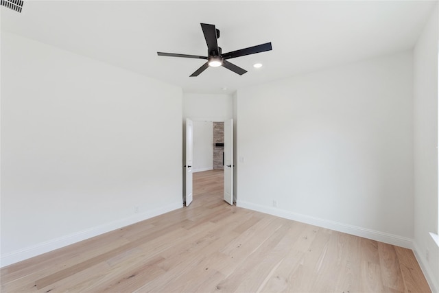 bedroom featuring light carpet, vaulted ceiling, and ceiling fan