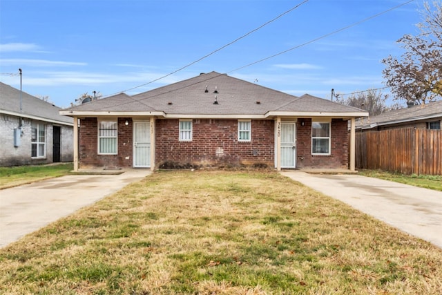 single story home with a front yard