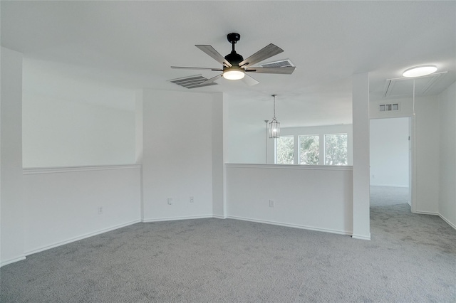 unfurnished room featuring carpet flooring and ceiling fan