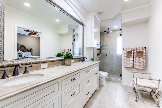 bathroom with tile patterned floors, ceiling fan, an enclosed shower, and ornamental molding