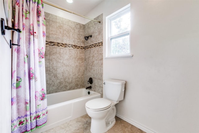 bathroom featuring tile patterned flooring, shower / bath combination with curtain, and toilet