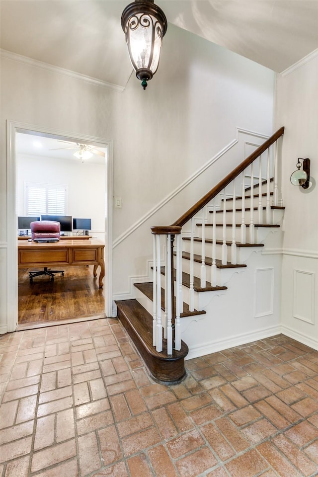 staircase with crown molding