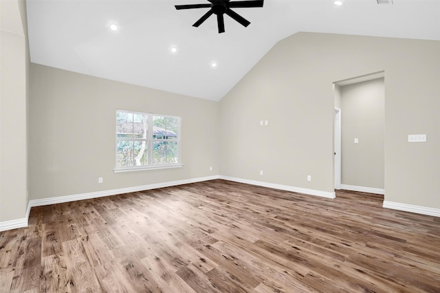 unfurnished living room featuring wood-type flooring, lofted ceiling, and ceiling fan