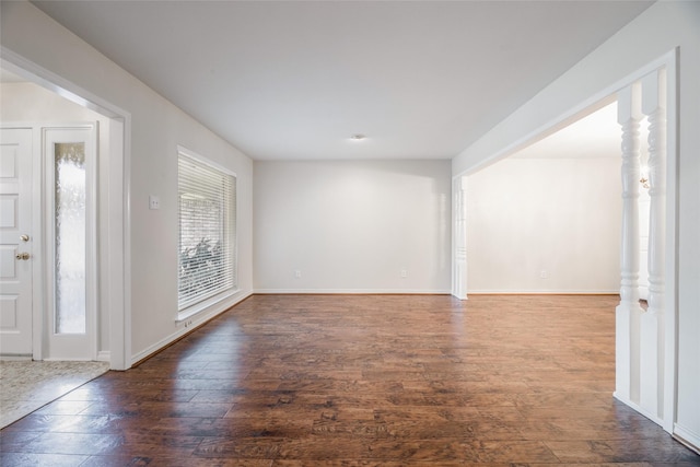 foyer with dark wood-type flooring